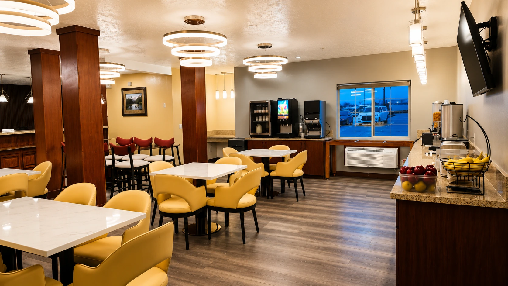 Coffee machines and a fruit basket beside the breakfast seating — Best Western Vernal Inn, Vernal Utah