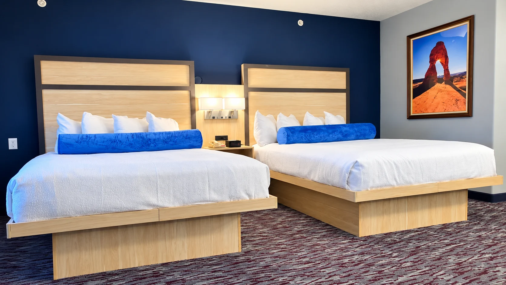 Two queen beds with framed Utah landscape artwork — Best Western Vernal Inn, Vernal Utah