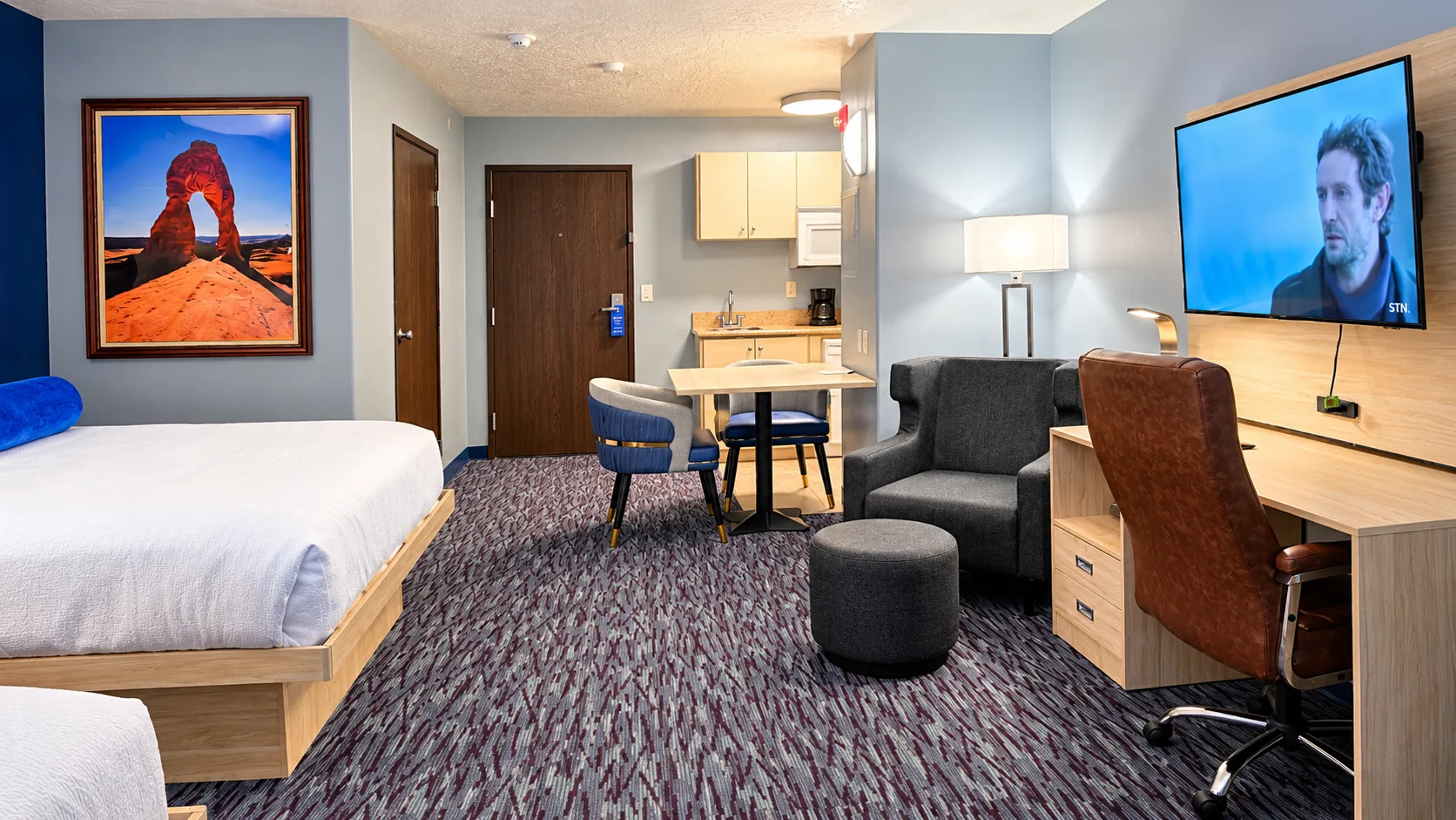 Full view of a Studio Two Queen showing entrance, kitchenette, seating and desk — Best Western Vernal Inn, Vernal Utah
